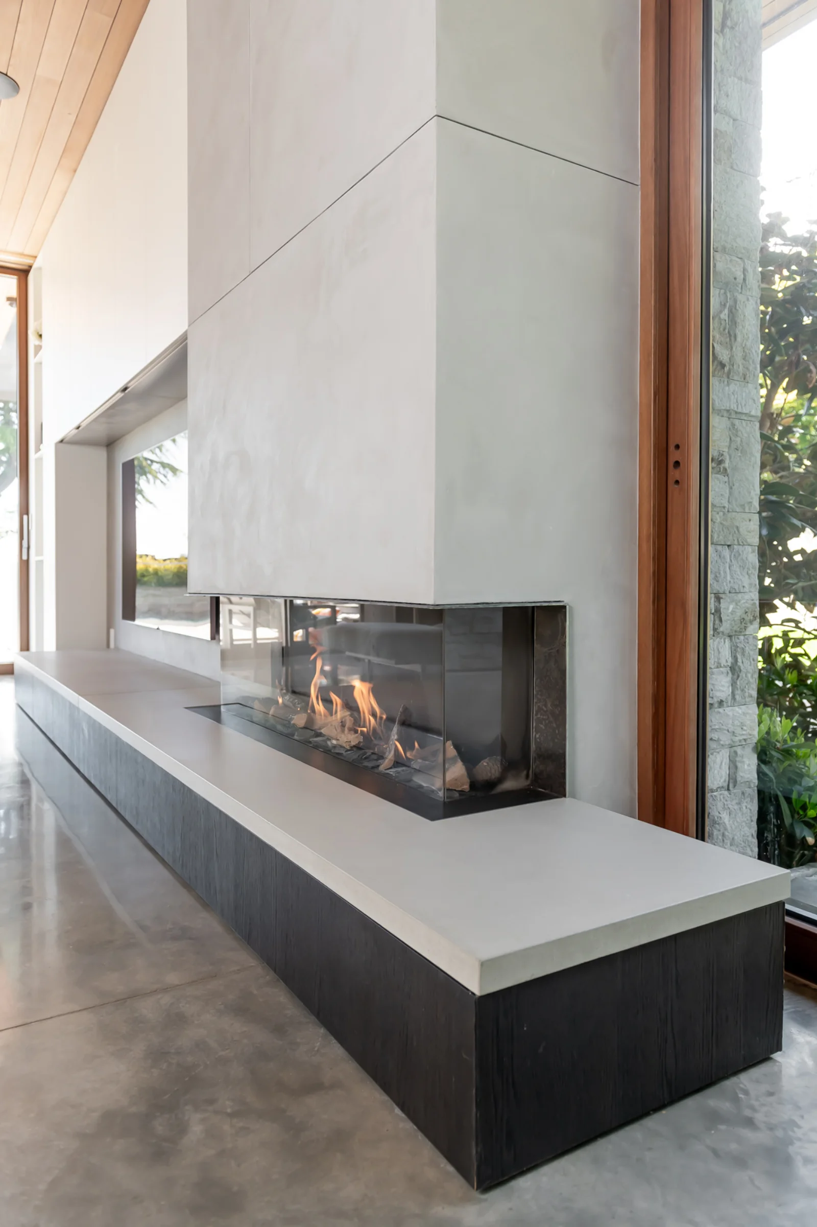 Hand-applied Venetian plaster fireplace by Shape of Paint